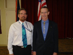 Chapter President Larry Singer (l) joins guest speaker Jerry Proctor, U.S. Army Intelligence Center, at the April chapter meeting.